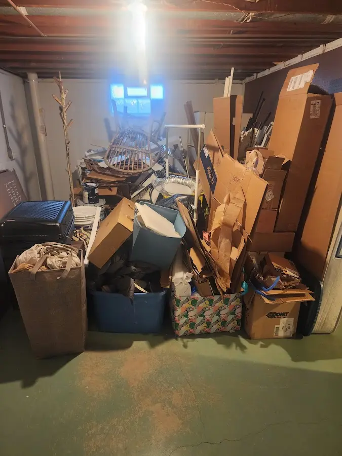 Roll-off dumpster container at job site for 20 Yard Dumpster Rental in Ross